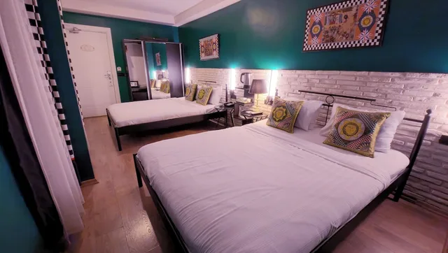 غرفة قياسية رباعية بسريرين كوين، Think Hotel 3/9