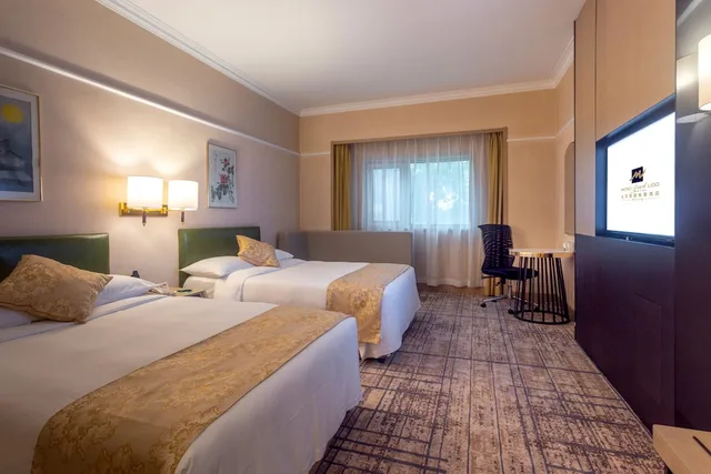 غرفة قياسية بسريرين مزدوجين بإطلالة على الحديقة، Metropark Lido Hotel 2/5