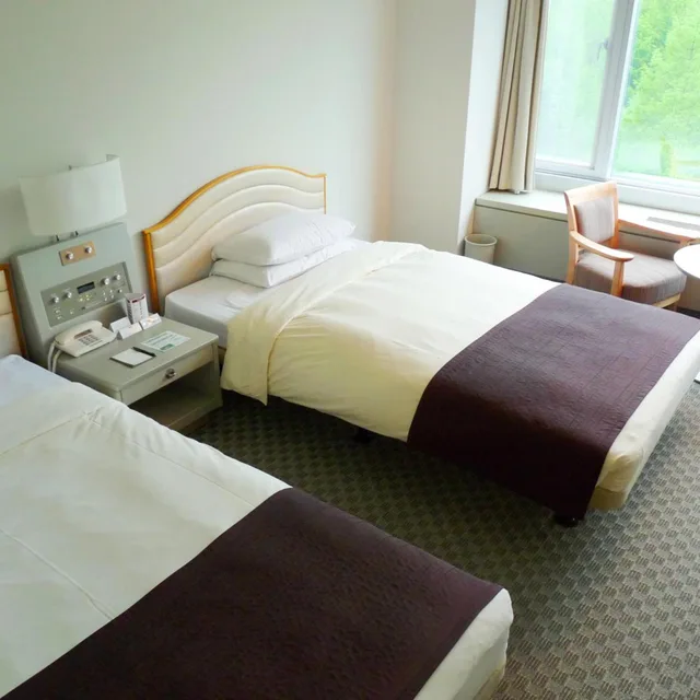 غرفة بسريرين منفصلين بإطلالة على الجبل في طابق مرتفع للمدخنين، Shin Furano Prince Hotel 2/6