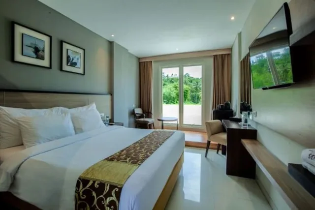 غرفة ديلوكس بسرير مزدوج، Montana Premier Senggigi 2/4