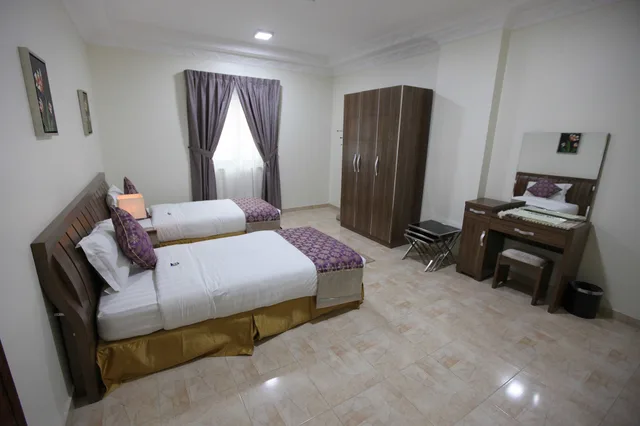 شقة بسرير مزدوج وسريرين منفصلين بغرفتي نوم، فندق برج العنوان(Enwan Suites Serviced Apartments) 5/10