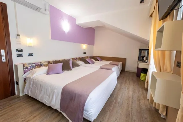 غرفة رباعية، Hotel Le Palme 3/4