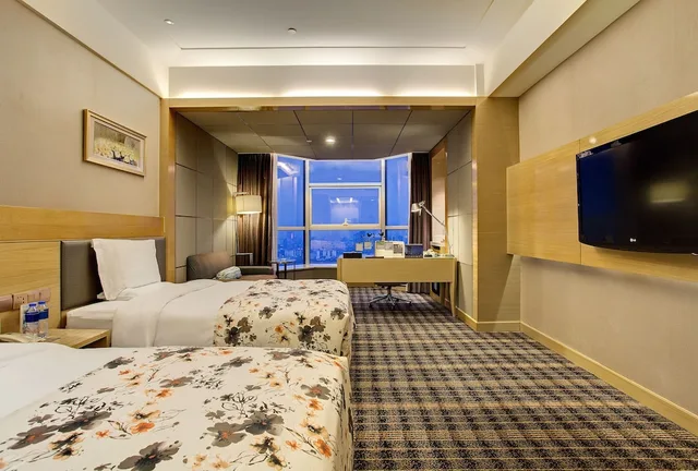 غرفة ديلوكس بسريرين منفصلين بإطلالة على النهر بغرفة نوم واحدة، Grand Skylight International Hotel Nanchang 2/2