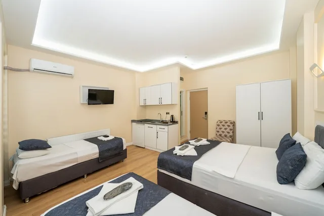 غرفة عائلية بسرير مزدوج وسريرين منفصلين، Luce Suites Taksim 1/5