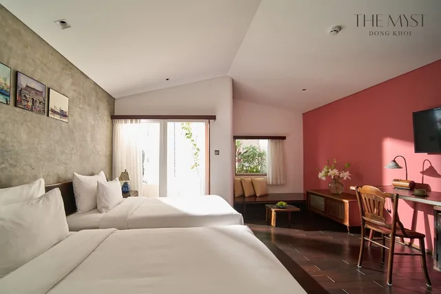 Serene Corner Balcony Twin Room، The Myst Dong Khoi 1/10
