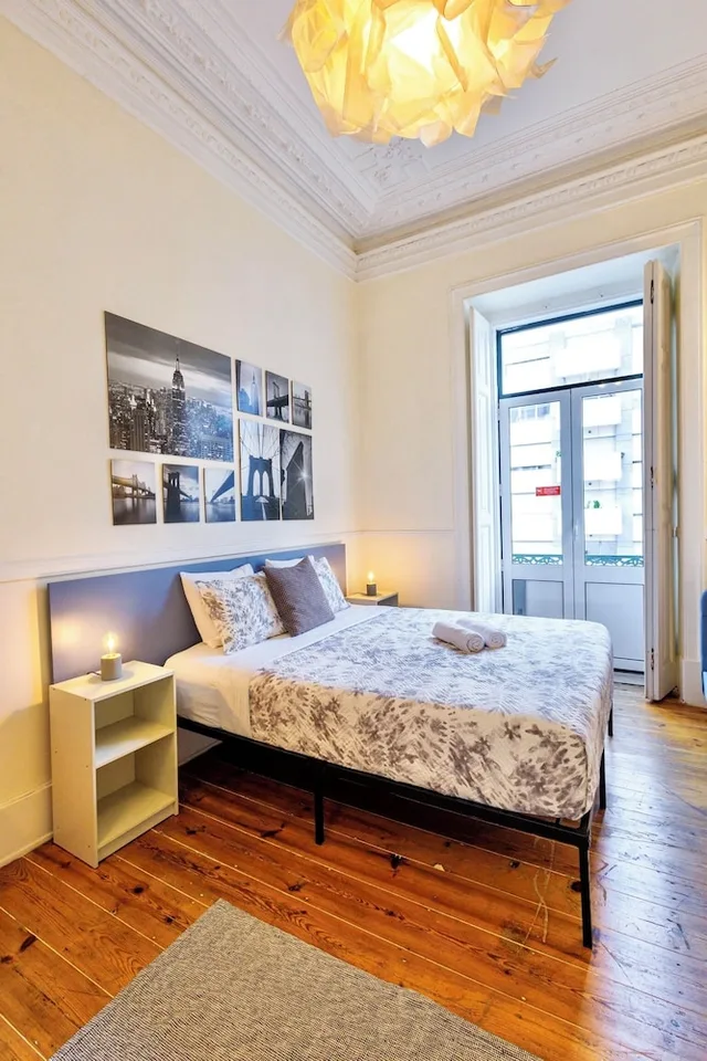 غرفة ديلوكس ثلاثية بسرير مزدوج وسرير فردي بإطلالة على المدينة بحمام مشترك، Ambiente Hostel 1/8