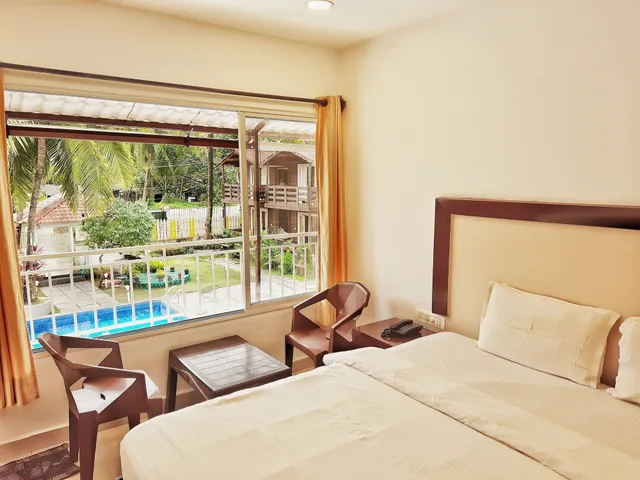 غرفة ديلوكس بسرير مزدوج بإطلالة على المسبح، Beach Walk Resort - Goa 4/4