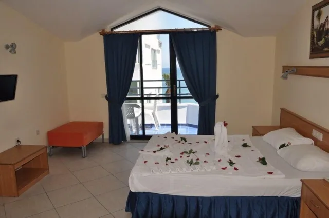 غرفة قياسية ثلاثية بسرير مزدوج وسرير فردي، Miranda Moral Beach Hotel 9/10