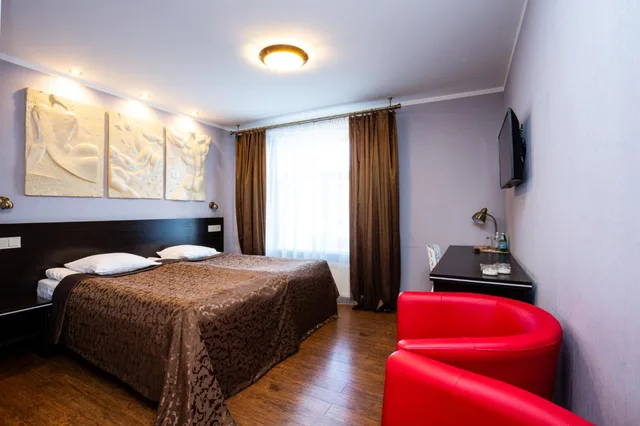 غرفة بسرير كوين، Primo Hotel 4/6