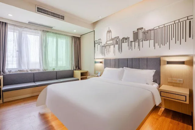 غرفة بزنس بسرير كوين، Yi Mi Hotel Luogang Jiada 2/2