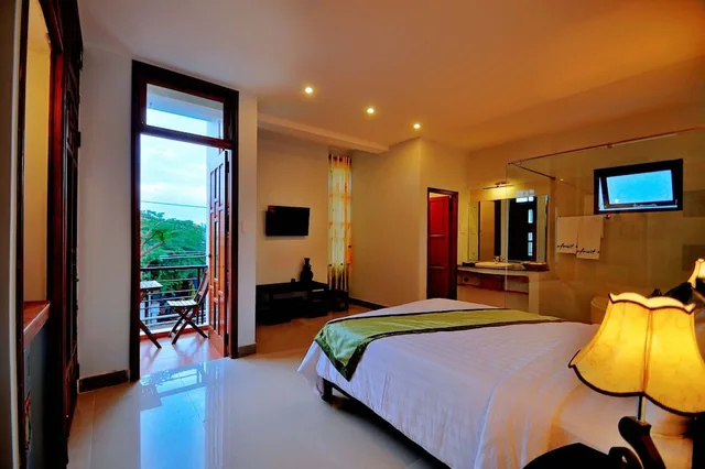 غرفة ديلوكس بسرير كينج بشرفة، Starfruit Homestay Hoi An 8/10