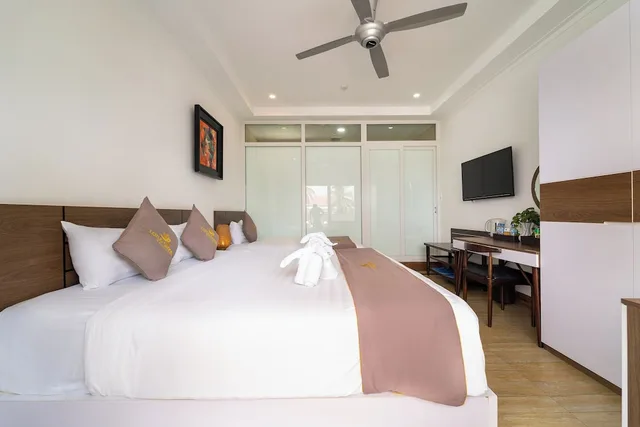 غرفة سوبيريور ثلاثية بسرير مزدوج وسرير فردي، Lotus Garden Resort 1/7
