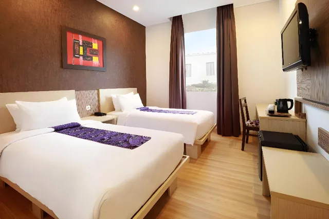 غرفة سوبيريور بسرير كينج وسرير كوين، Swiss-Belinn Panakkukang Makassar 1/1