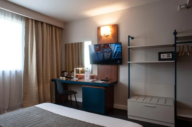 غرفة سوبيريور ثلاثية مع أريكة، La Meridiana Bleisure Hotel 10/10
