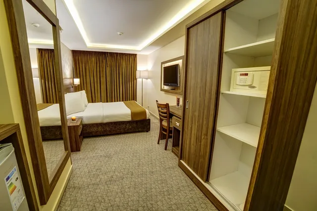 غرفة ديلوكس مفردة بسرير كوين، Nairoukh Hotel Aqaba 3/3