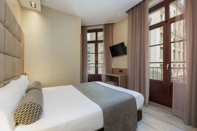 غرفة مفردة بسرير كوين، Hotel Suizo 3/8