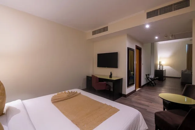 جناح ديلوكس بسرير كينج، Villaggio Hotel and Resort Abu Dhabi 1/8