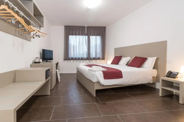 غرفة بسرير مزدوج أو سريرين منفصلين، Cascina Fossata Hotel Residence 4/10