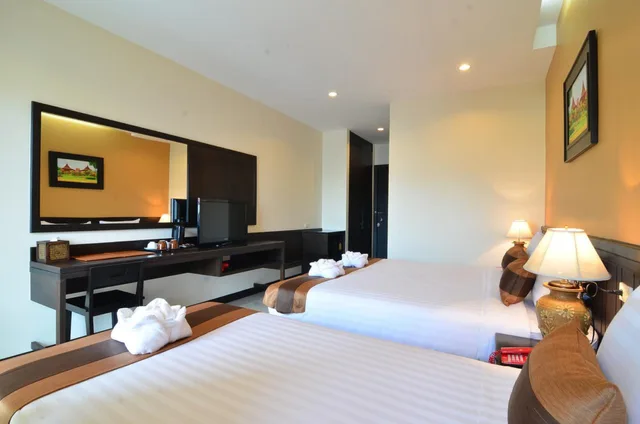 غرفة قياسية ثلاثية بسرير مزدوج وسرير فردي، Thongta Spa & Resort 2/3