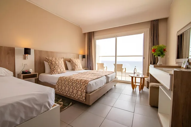 جناح جونيور بإطلالة على المدينة، Riadh Palms Resort & Spa 1/1