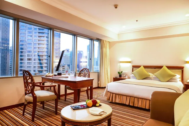 غرفة ديلوكس بسرير كوين بإطلالة على المدينة، Jin Jiang Tower Hotel 1/2