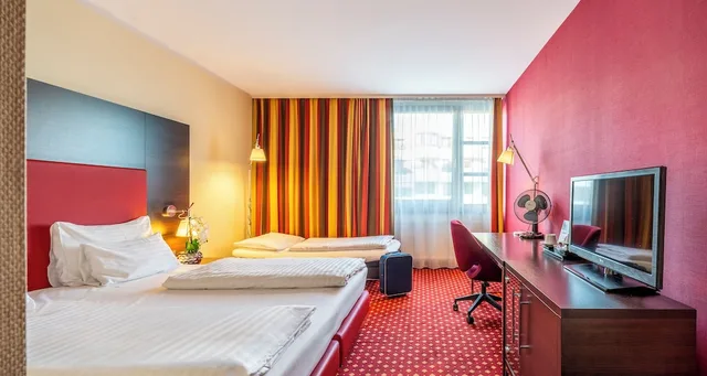 غرفة كومفورت ثلاثية بسرير مزدوج، PLAZA INN Wels 1/7