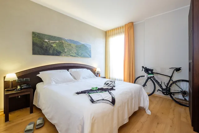 غرفة ثلاثية بسرير كينج وسرير فردي، Hotel San Giacomo Sport & Relax 1/2