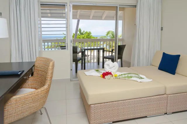 غرفة بسرير كينج بإطلالة على البحر، Radisson Grenada Beach Resort 1/2