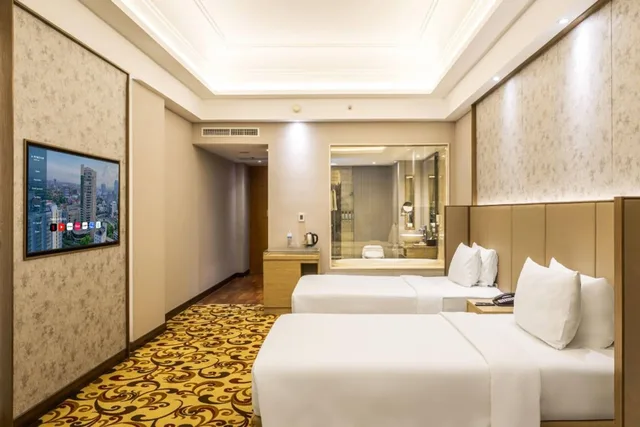غرفة غراند ديلوكس بسريرين منفصلين، Wyndham Surabaya City Centre 1/2