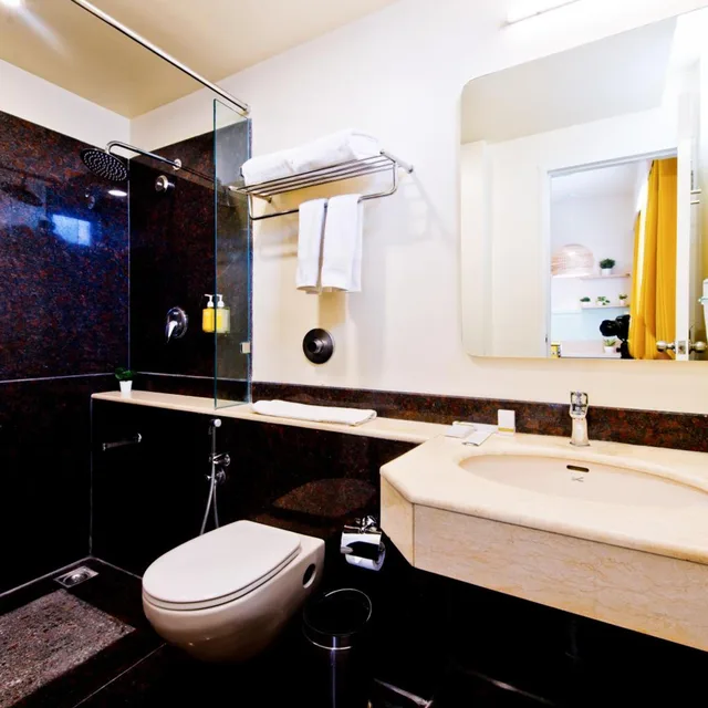 جناح ديلوكس بسريرين منفصلين، Bloom Hotel Indiranagar 5/5