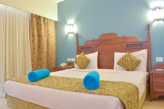 غرفة عائلية بسرير كينج وسريرين منفصلين بإطلالة على الحديقة، Jasmine Palace Resort and Spa 2/10