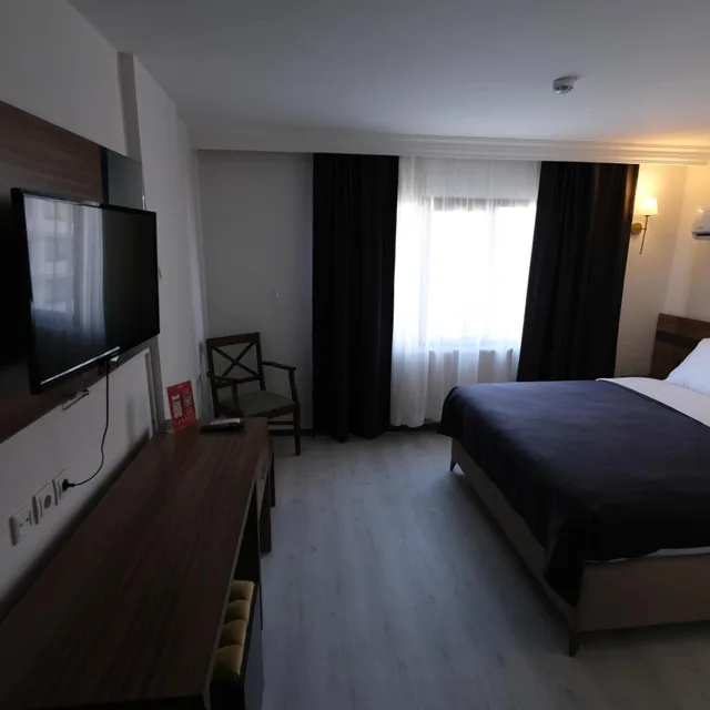 غرفة قياسية بسرير مزدوج أو سريرين منفصلين، Üstün Otel Alsancak 1/10