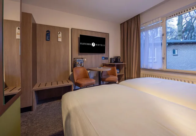 غرفة صغيرة بسريرين منفصلين، Fletcher Parkhotel Val Monte 1/3