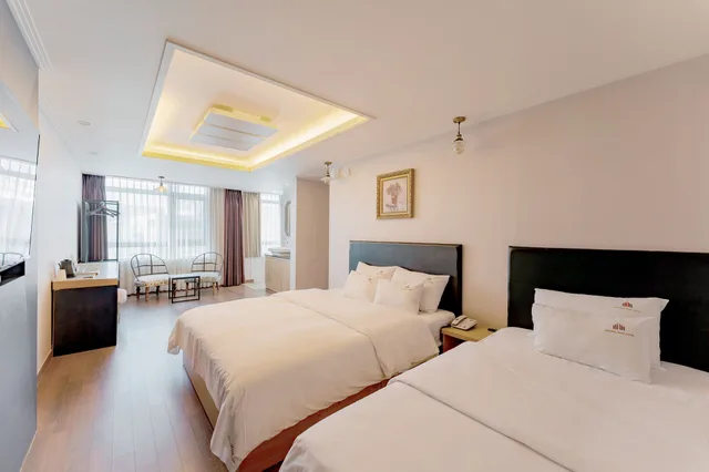 غرفة ديلوكس عائلية بسريرين منفصلين وسرير مزدوج وسرير فردي بإطلالة على المدينة، Central Park Hotel Busan 2/10