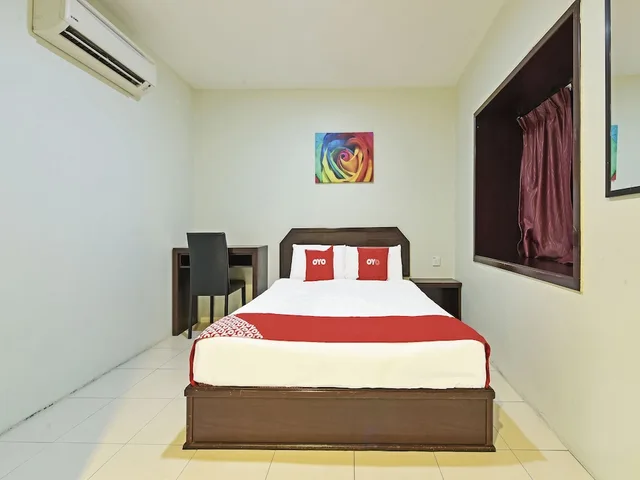 غرفة ديلوكس مزدوجة، Capital O 90545 Ho Hotel 1/2