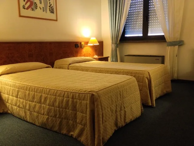 غرفة قياسية بسرير مزدوج أو سريرين منفصلين، Motel Europa 1/2