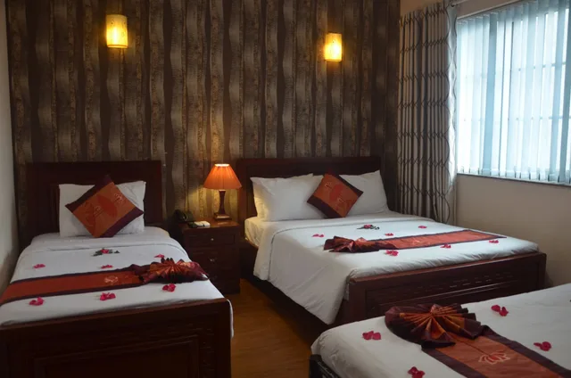 غرفة ديلوكس عائلية بسرير كوين وسرير فردي، Phoenix Legend Hotel 5/10