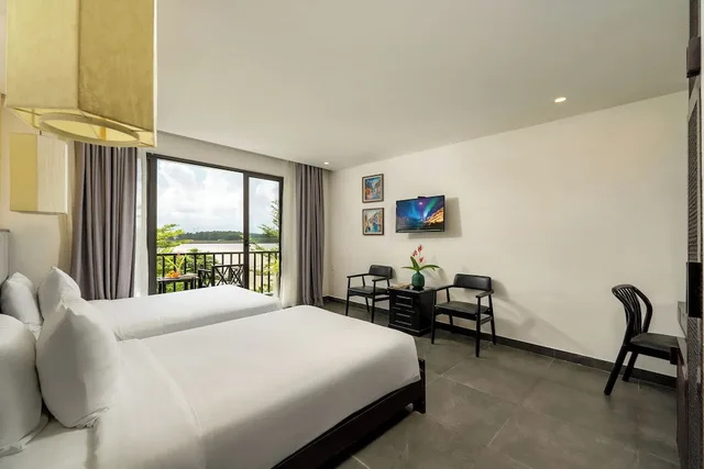 غرفة بسريرين منفصلين بشرفة، Gia Huy Riverside Hotel Hoi An 4/10