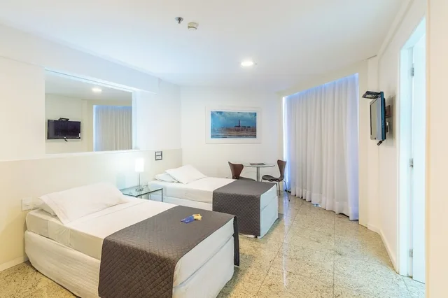 غرفة بريميوم بسريرين منفصلين بإطلالة جزئية على البحر، Hotel Brisa Tower Maceio 1/1