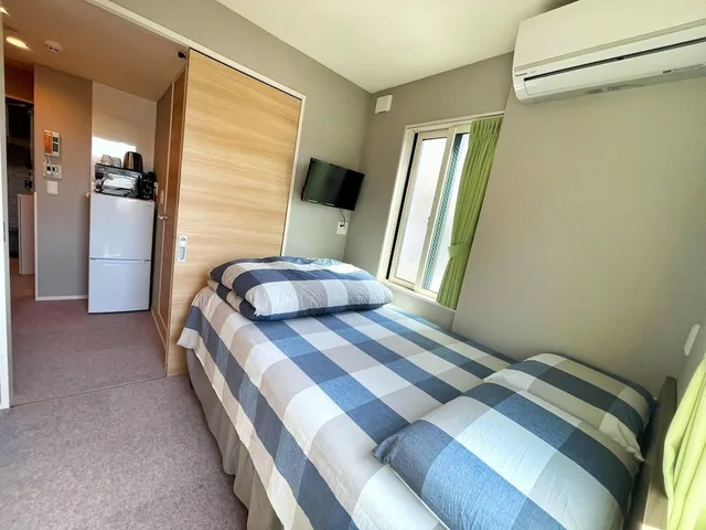 غرفة عائلية بسريرين منفصلين في المبنى الرئيسي، Shinjuku Warm House 4/10