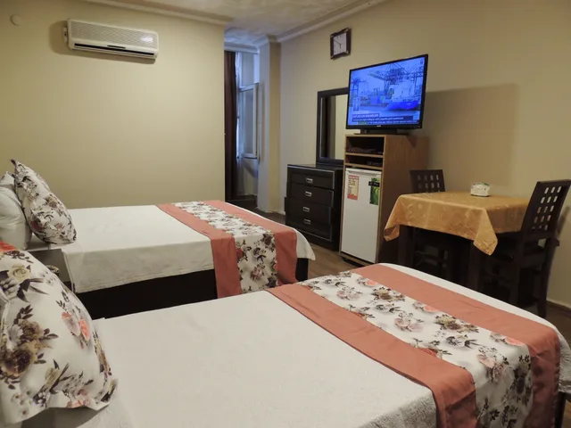 غرفة قياسية ثلاثية بسرير مزدوج وسرير فردي، Adana Saraya Hotel 4/9