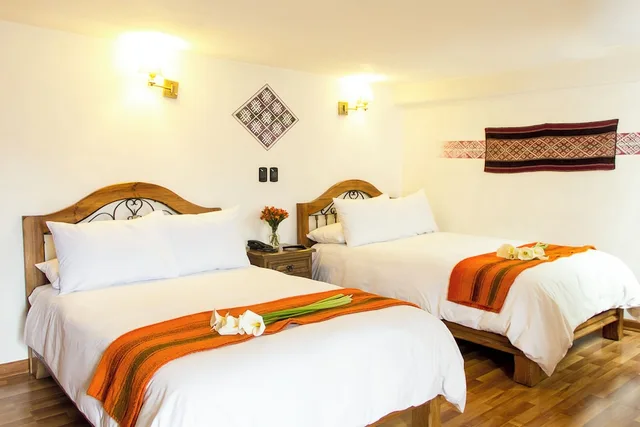 غرفة سوبيريور ثلاثية بسرير فردي بإطلالة على الفناء بغرفة نوم واحدة، Casa San Blas Boutique Hotel 3/6