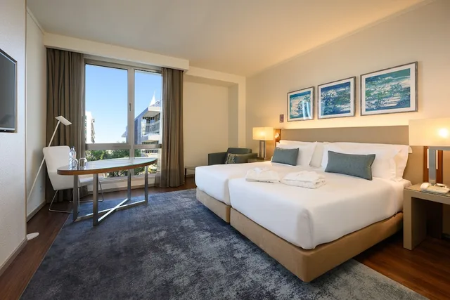 غرفة بريميوم بسرير كوين بإطلالة على النهر، Melia Lisboa Oriente 1/4