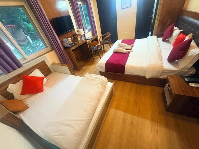 Family, 1 King and 1 Single Beds, Hill View، Damyanti Residency Hotel 1/3