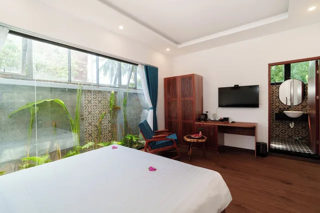 غرفة ديلوكس بسرير كينج بإطلالة على الحديقة، Gia Huy Riverside Hotel Hoi An 10/10