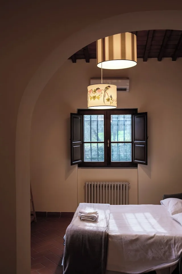 غرفة عائلية بسريرين كينج بإطلالة على الحديقة مع أريكة، Villa Castiglione 1/10