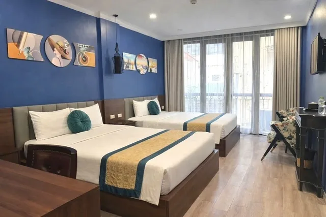 غرفة عائلية رباعية بسريرين كوين، Suddha Boutique Hotel 1/4