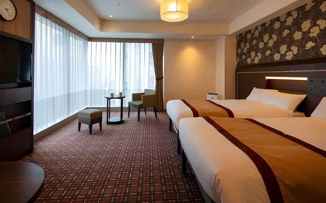 غرفة ديلوكس ثلاثية بسريرين منفصلين، Hotel Monterey Fukuoka 1/1
