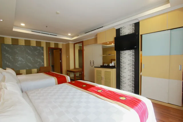 جناح عائلي بسرير مزدوج، SWISS-BELHOTEL MALEOSAN MANADO 1/3