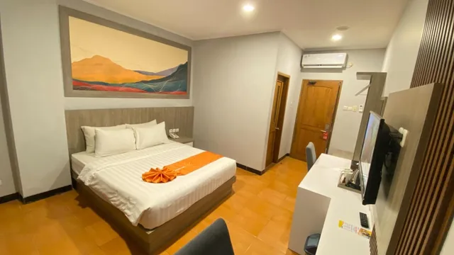 غرفة ديلوكس بسرير كوين، Front One Hk Resort Semarang 1/6